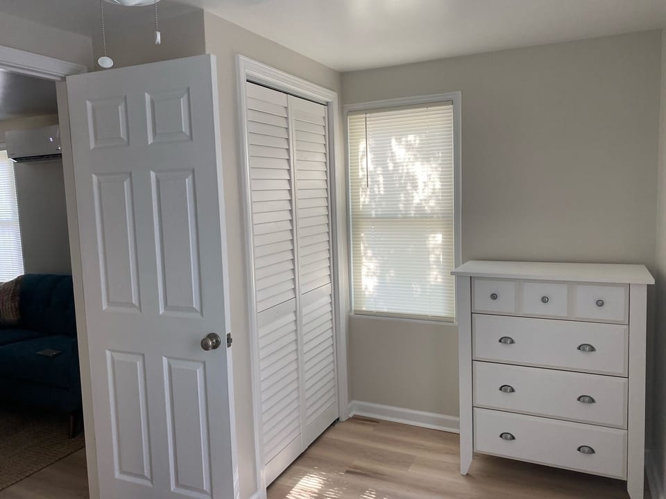 Hang your clothes are put them in the 4 drawer dresser.