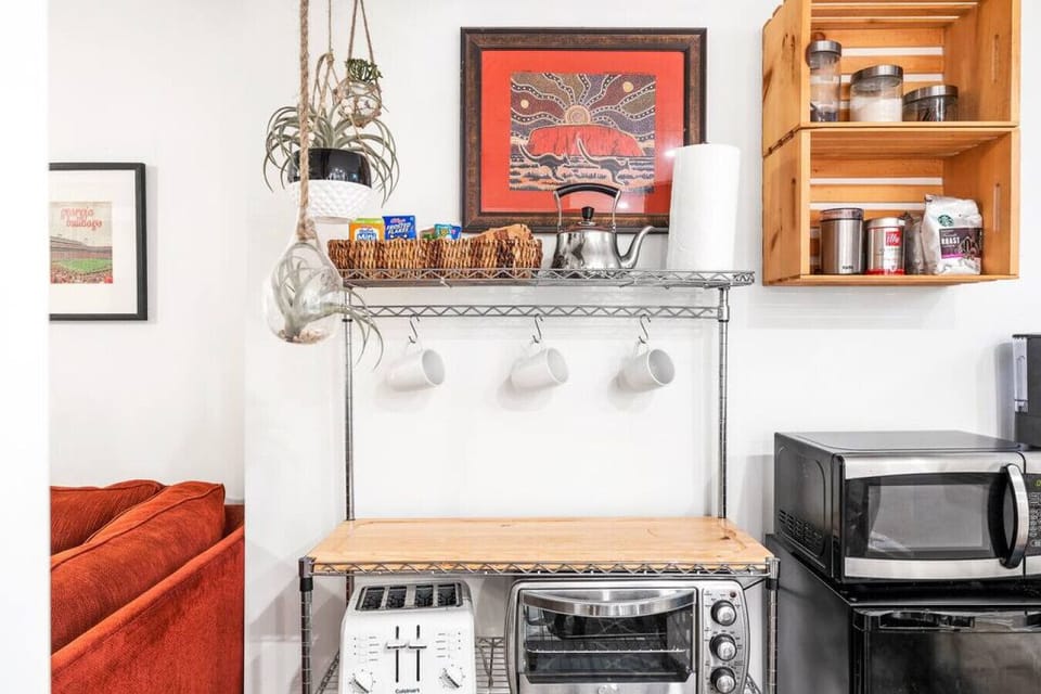 A toaster and coffee mugs are provided as well