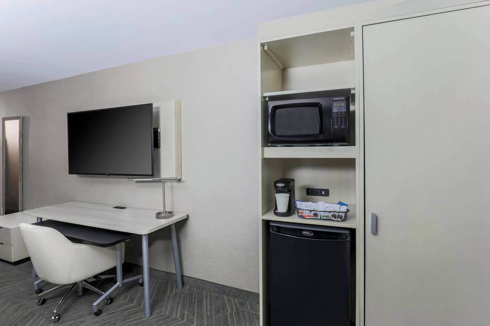 Premium bedding, down comforters, pillowtop beds, desk