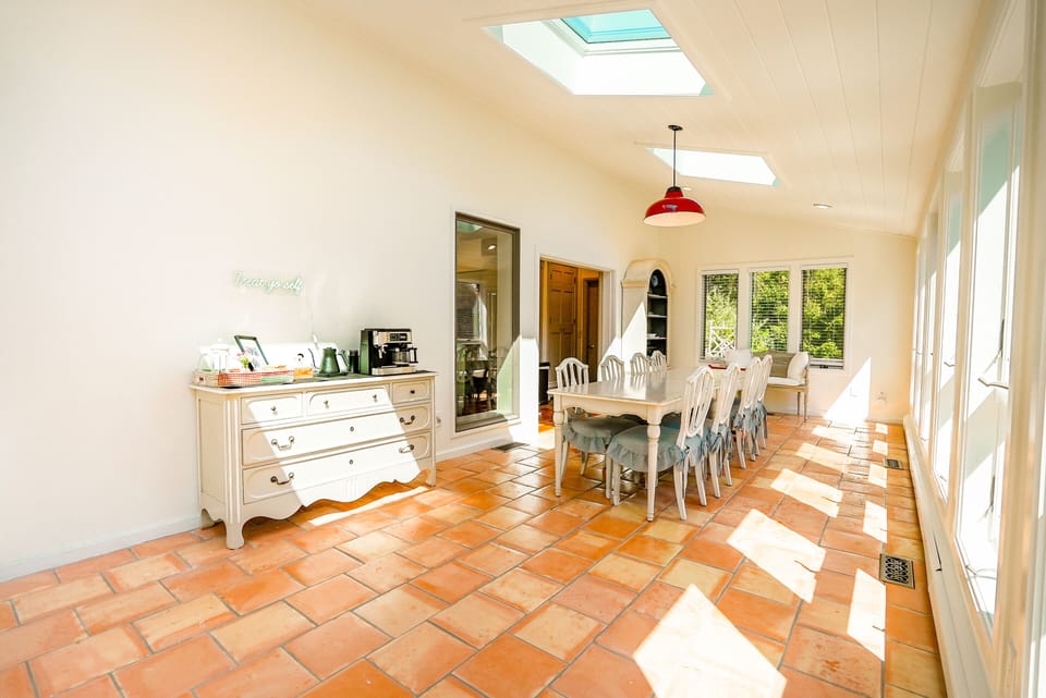 1ST FLOOR: Dining table and coffee station