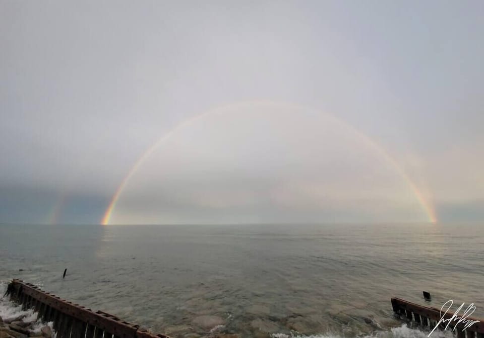 We see rainbows over the lake