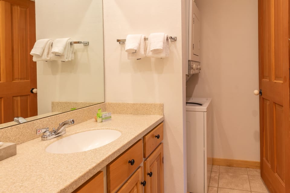 Primary Bathroom With Laundry