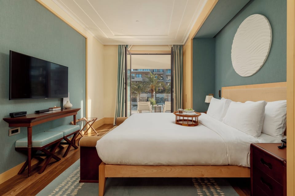 Premium bedding, down comforters, memory foam beds, minibar