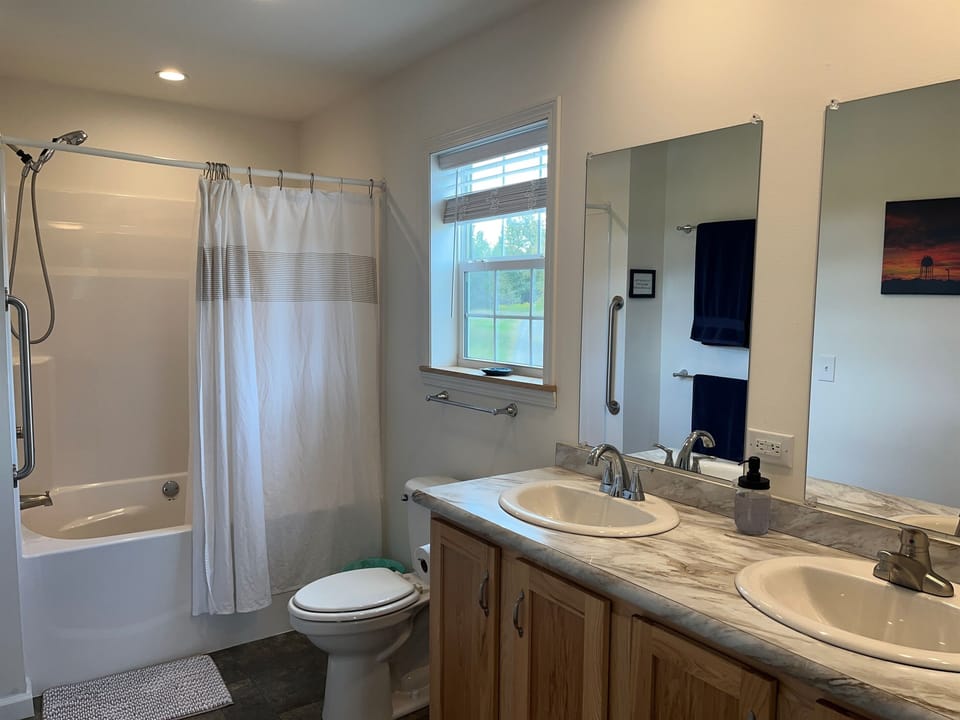Main level primary bedroom ensuite bath