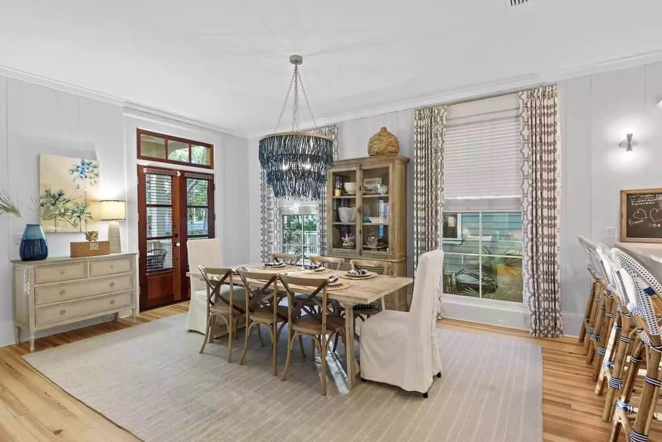 Dining area under chandelier lighting
