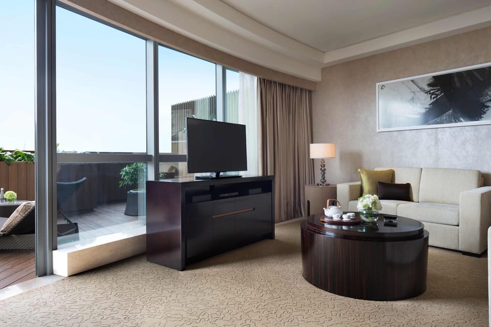 Club Suite, 1 Bedroom (View) | Living area | 42-inch LED TV with satellite channels, TV