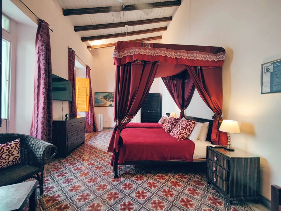 Premium bedding, down comforters, pillowtop beds, in-room safe