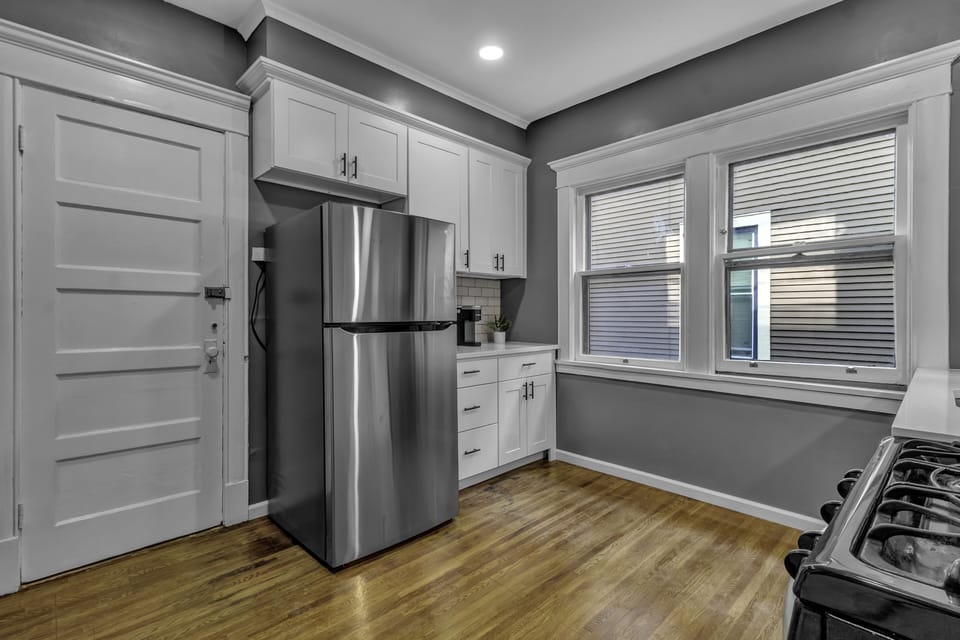 Kitchen has a toaster and Keurig as well as a few pots and pans.