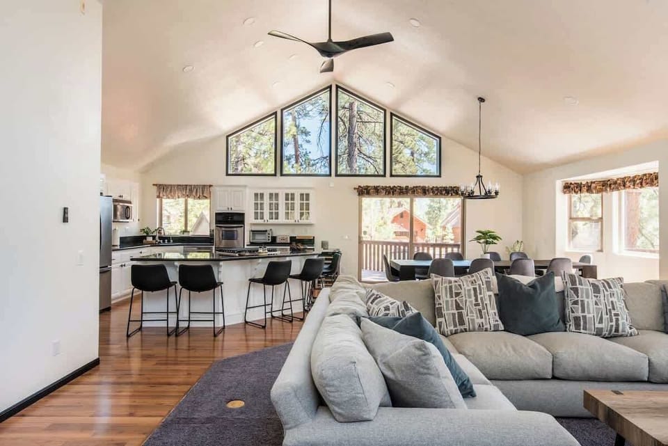 OPEN FLOOR PLAN, LIVING ROOM, DINING ROOM AND KITCHEN AREA ON MAIN FLOOR WITH ACCESS TO THE DECK