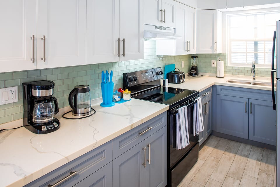 Townhome, 2 Bedrooms, Pool View | In-room safe, laptop workspace, blackout drapes, iron/ironing board
