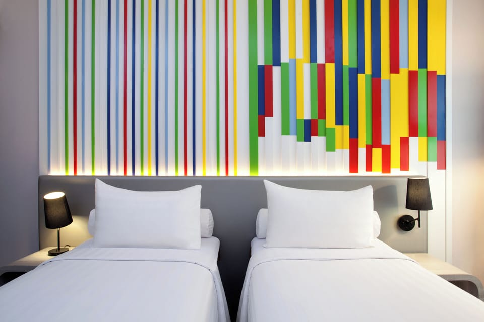 Family Room, Multiple Beds | Minibar, in-room safe, desk, blackout drapes