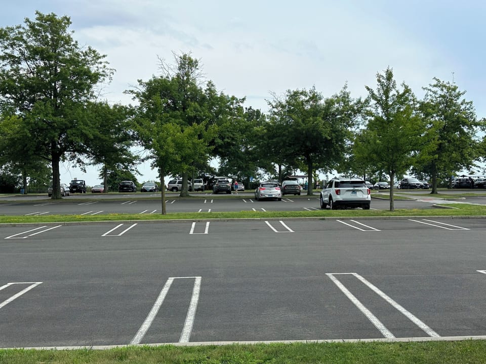 The main Walnut Beach parking lot. Resident sticker is required. I provide one
