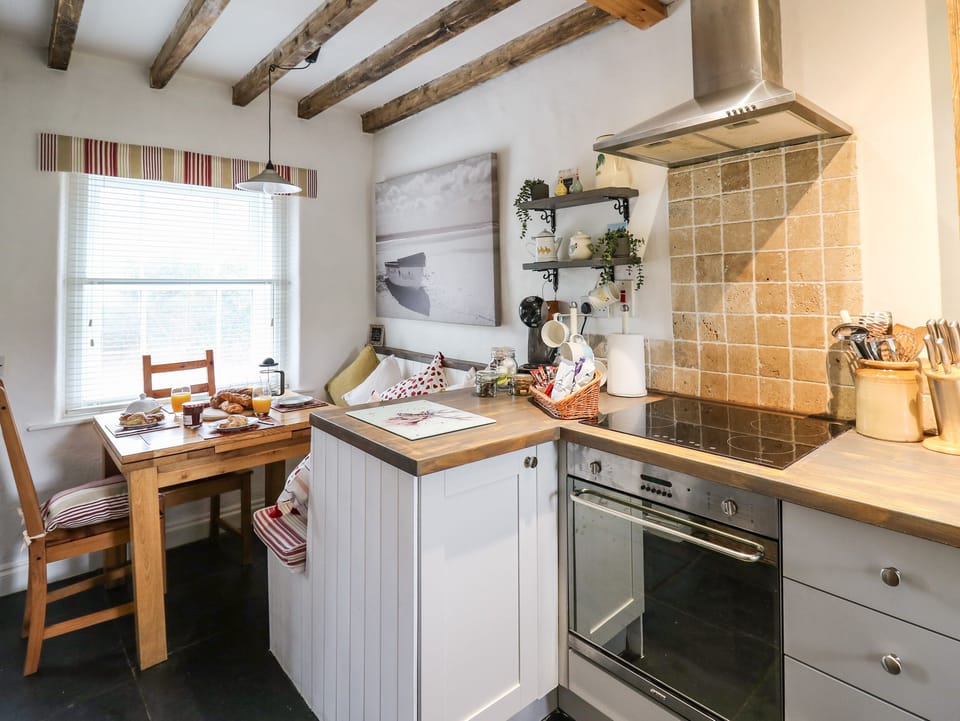 Fridge, electric kettle, cookware/dishes/utensils