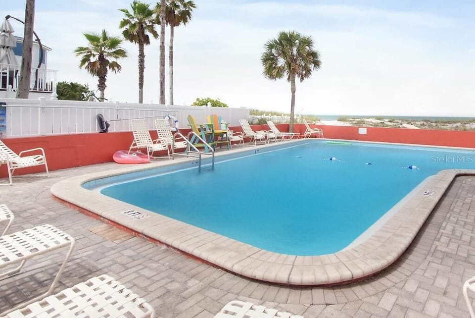 Heated beachfront pool steps from the Gulf in Treasure Island