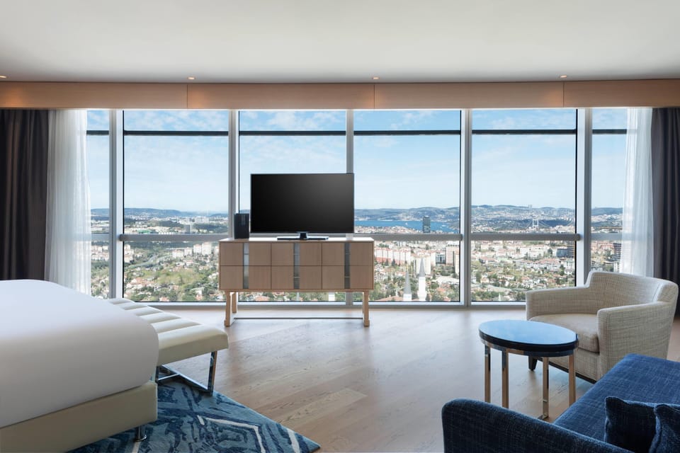 Suite, 1 Bedroom, Kitchenette, Partial Sea View (Tower) | Premium bedding, minibar, in-room safe, desk