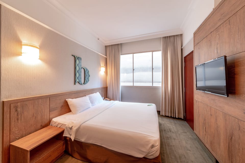 Deluxe Double Room | In-room safe, blackout drapes, iron/ironing board (on request)
