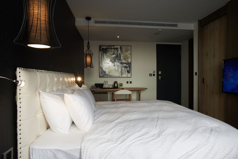Down comforters, pillowtop beds, in-room safe, individually decorated