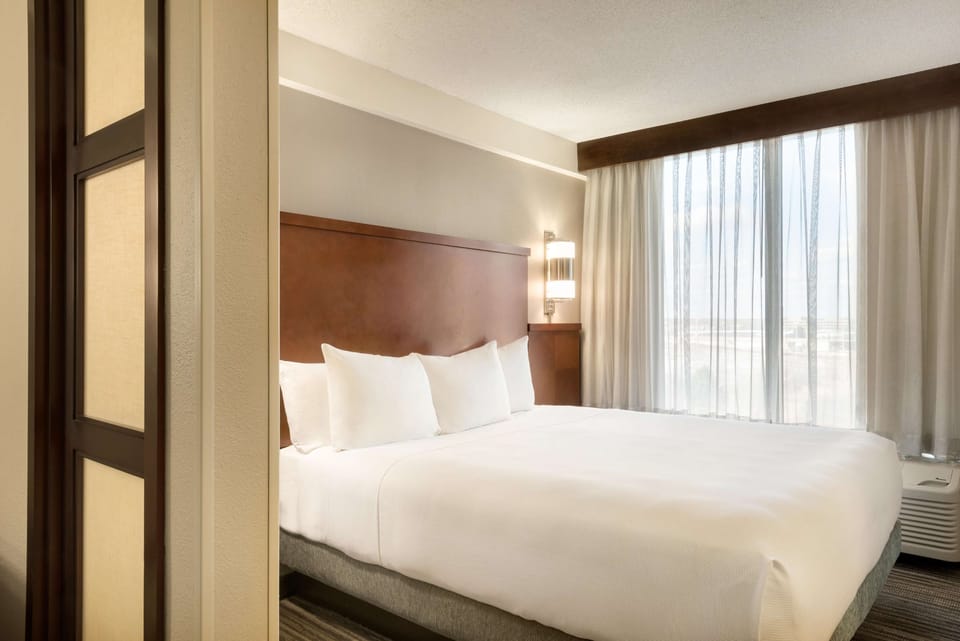 Premium bedding, down comforters, desk, laptop workspace