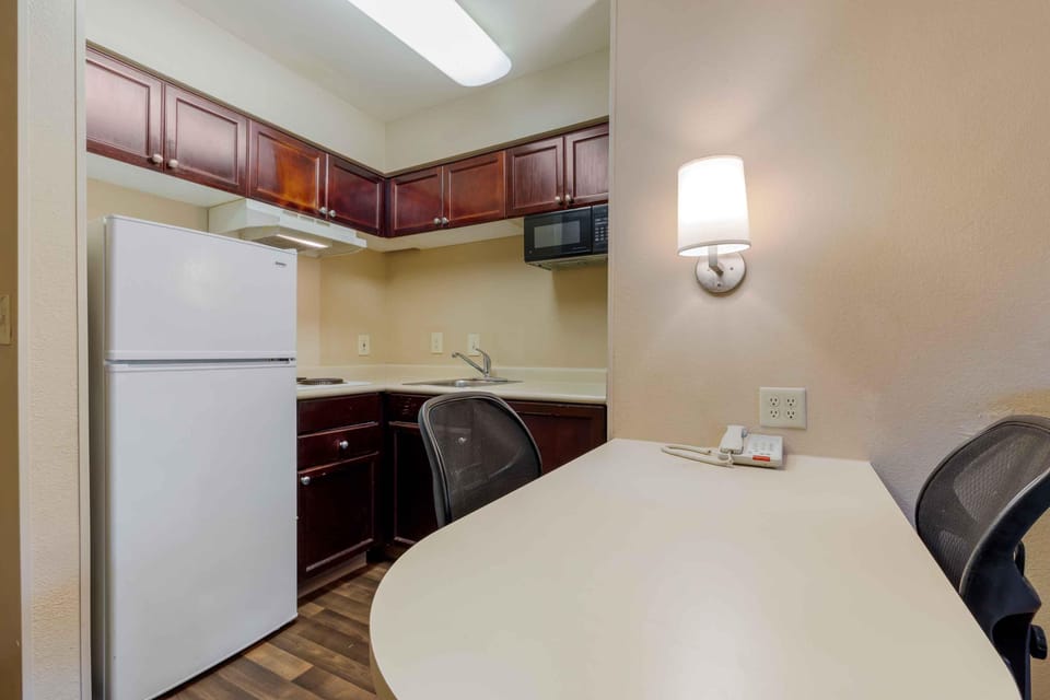 Deluxe Studio, Multiple Beds, Non Smoking | Private kitchen | Full-size fridge, microwave, stovetop, coffee/tea maker