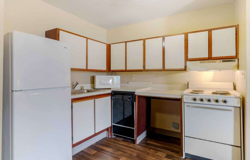 Deluxe Studio, 1 Queen Bed with Sofa bed, Accessible, Non Smoking | Private kitchen | Full-size fridge, microwave, stovetop