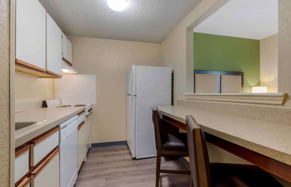 Deluxe Studio, 1 Queen Bed with Sofa bed, Non Smoking | Private kitchen | Full-size fridge, microwave, stovetop