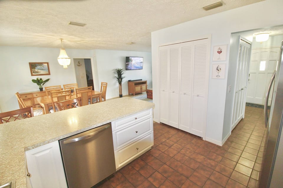 The kitchen view into the dining area.