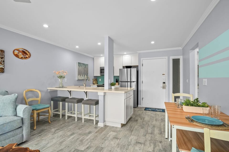 Your open concept retreat blends kitchen, dining, and living spaces, inviting you to unwind in style.