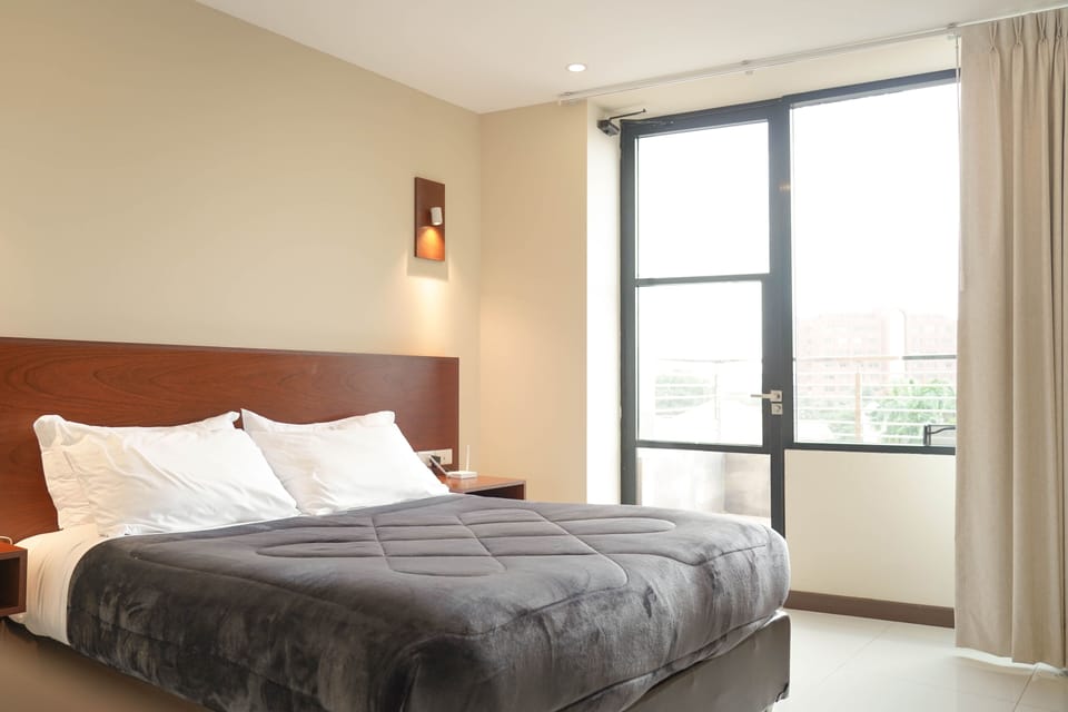 Deluxe Double Room, Balcony, City View | Premium bedding, down comforters, in-room safe, desk