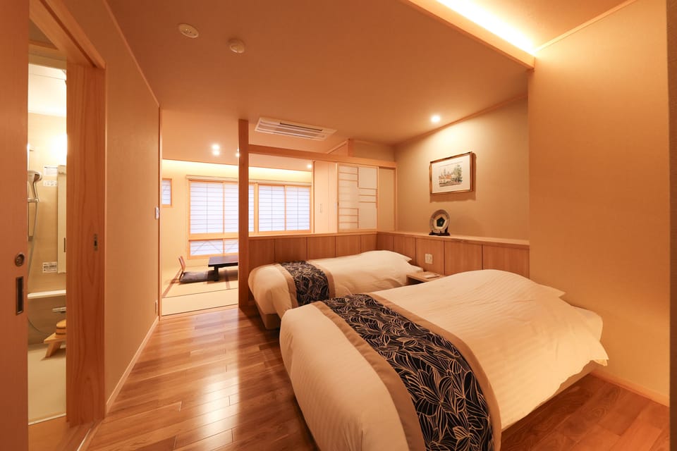 Deluxe Room with Tatami Area with Private Bathroom, Non-Smoking | Down comforters, minibar, in-room safe, individually furnished