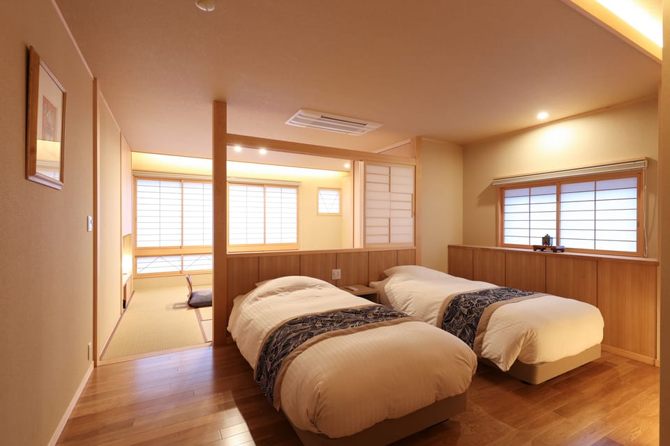 Deluxe Room with Tatami Area with Private Bathroom, Non-Smoking | Down comforters, minibar, in-room safe, individually furnished