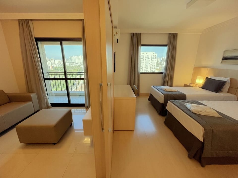 Suíte Super Luxo Solteiro | Premium bedding, minibar, in-room safe, desk