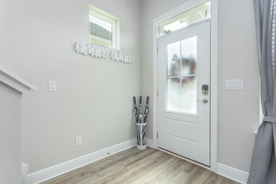 Cottage Entryway. Hang your coat or bags. We also provide umbrellas.  