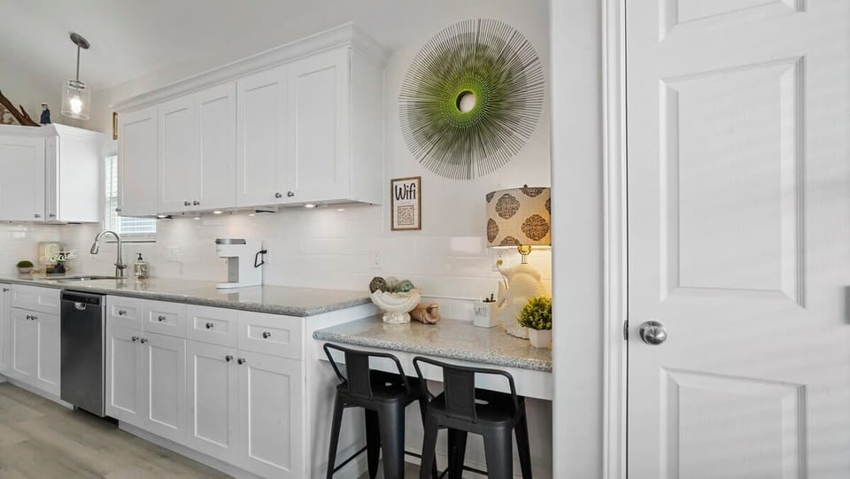 Workstation in kitchen to connect you devices and work remotely if needed.