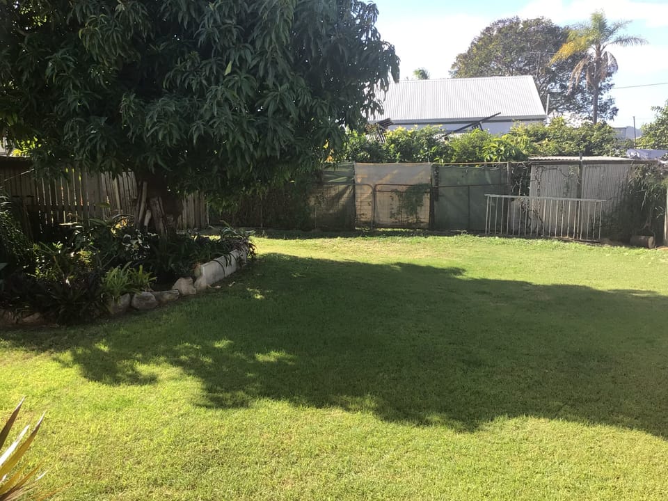 Backyard. Parking available via driveway to side street 