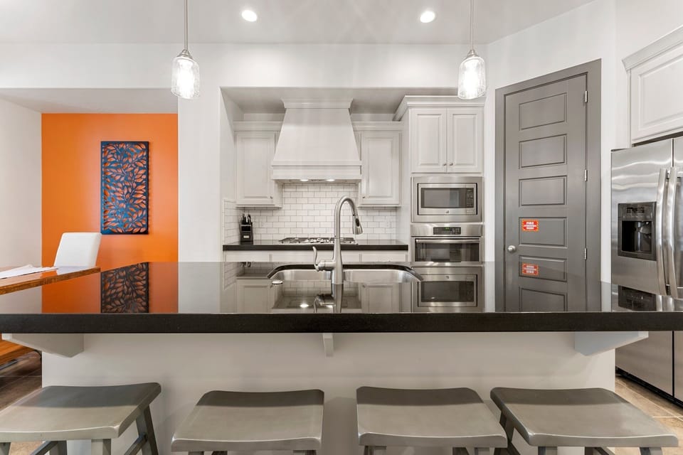 Townhome, 4 Bedrooms | Private kitchen | Coffee/tea maker, fridge, oven, toaster
