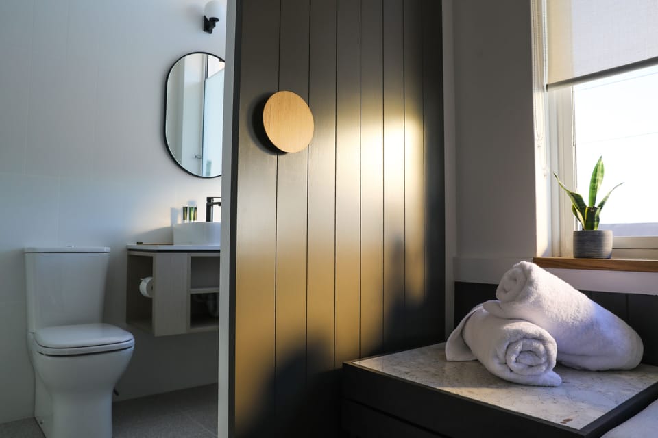 Shower, rainfall showerhead, towels