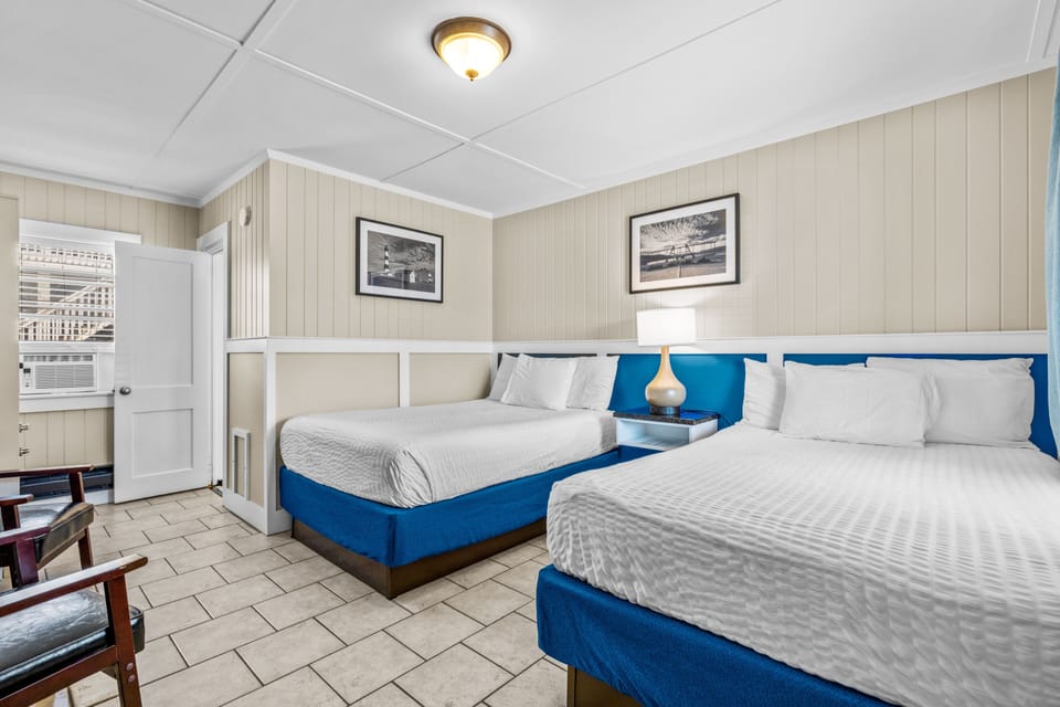 Standard Room, 2 Double Beds, Courtyard View | Free WiFi, bed sheets