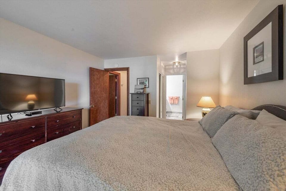 Primary Bedroom with Ensuite Bathroom and Balcony