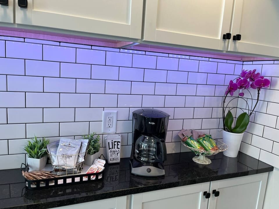 Grab a hot beverage and snack from the fully stocked coffee bar.