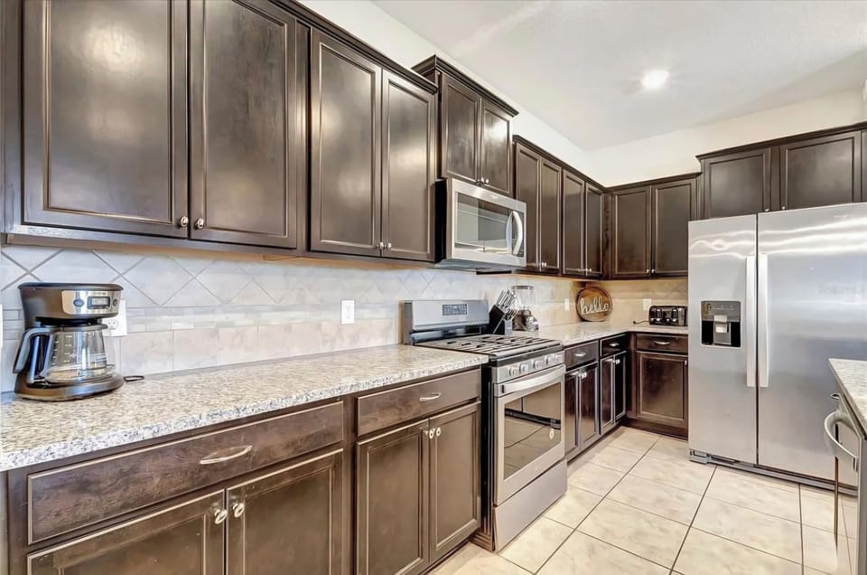 Fully stocked kitchen with modern appliances