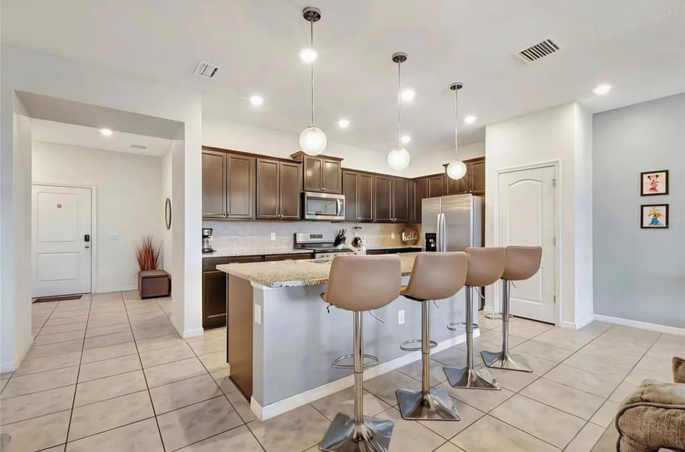 Fully stocked kitchen with modern appliances