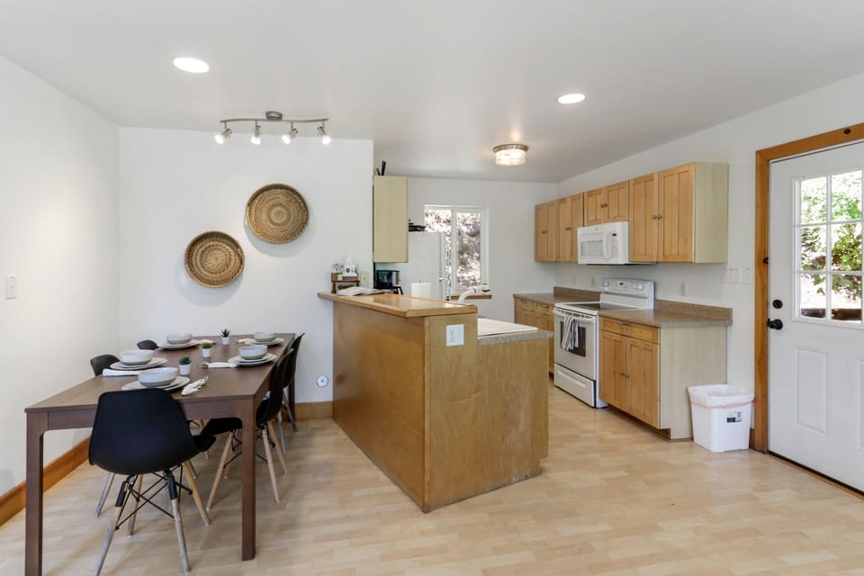 Access the back deck with gas grill directly from the kitchen.