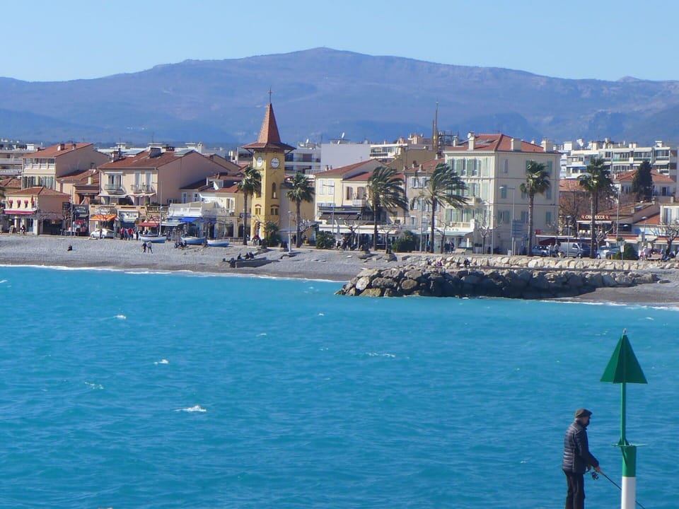 Water, Sky, Building, Blue, Azure, Mountain, Coastal And Oceanic Landforms, Body Of Water, Tower