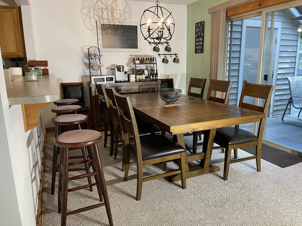 Dining Room with Coffee and Breakfast Bars.  Seating for 12 family and friends.