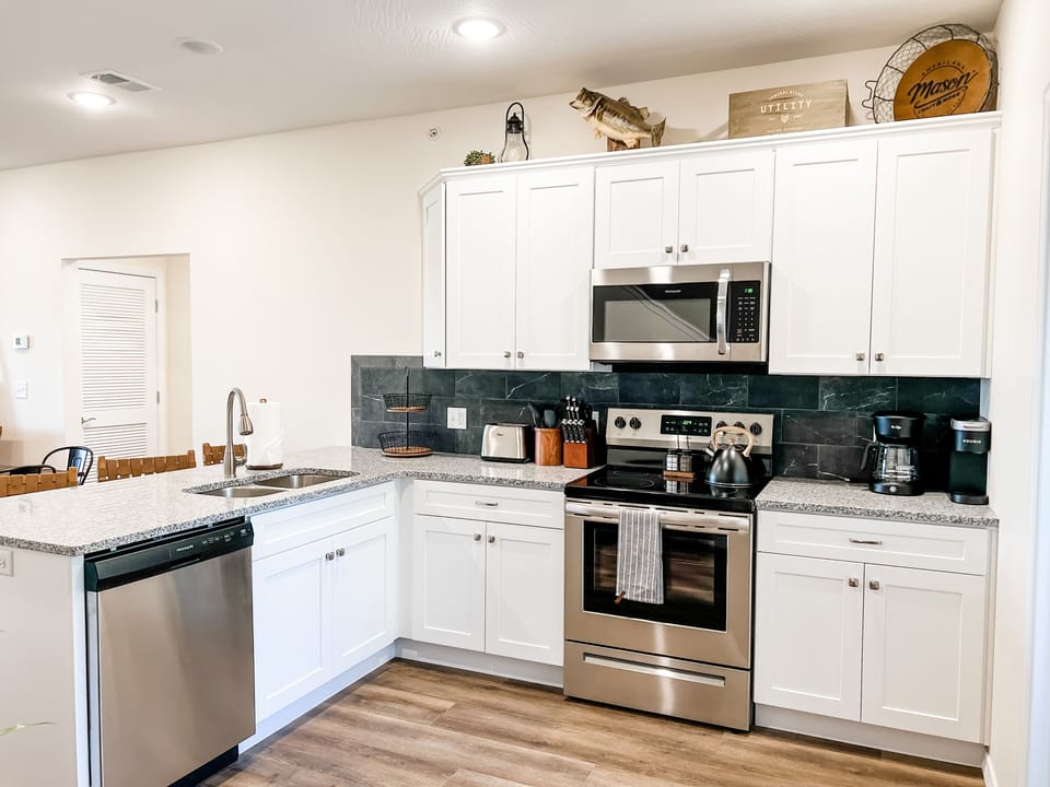 Stocked with pots, pans, and all the extras you would need to cook up your favs!