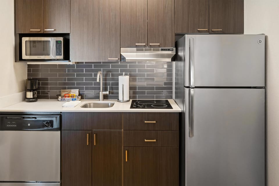 Suite, 1 Bedroom (King and Murphy Bed) | Private kitchen | Coffee/tea maker, microwave, cookware/dishes/utensils