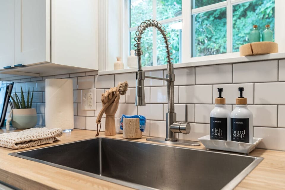 Kitchen is stocked with cleaning supplies.