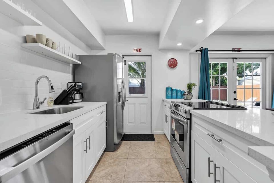 “Fully equipped kitchen with modern appliances—cook, dine, and enjoy your Airbnb getaway.”
