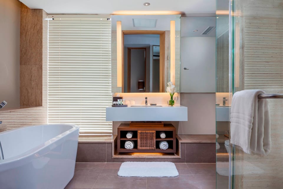 Suite, 2 Bedrooms | Bathroom | Shower, rainfall showerhead, designer toiletries, hair dryer