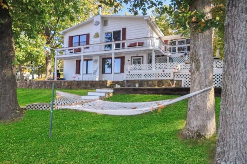 The gentle sloping yard creates some space for enjoyment on the hammock or the fire pit area.